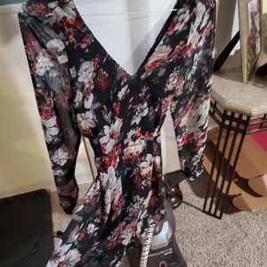 Never worn floral long sleeve romper